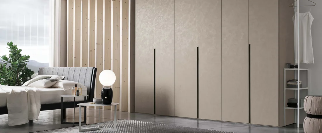 Hinged-door wardrobe in a cream finish