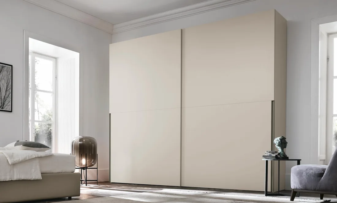 Sliding-door wardrobe in a cream finish