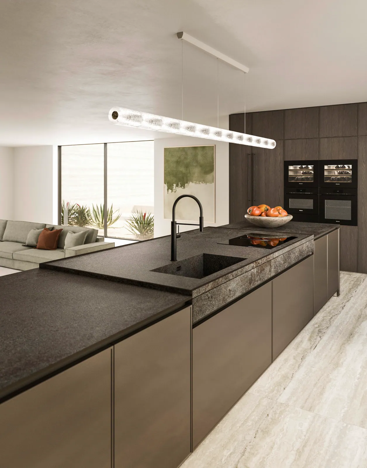 Keuken met centraal eiland badend in het licht